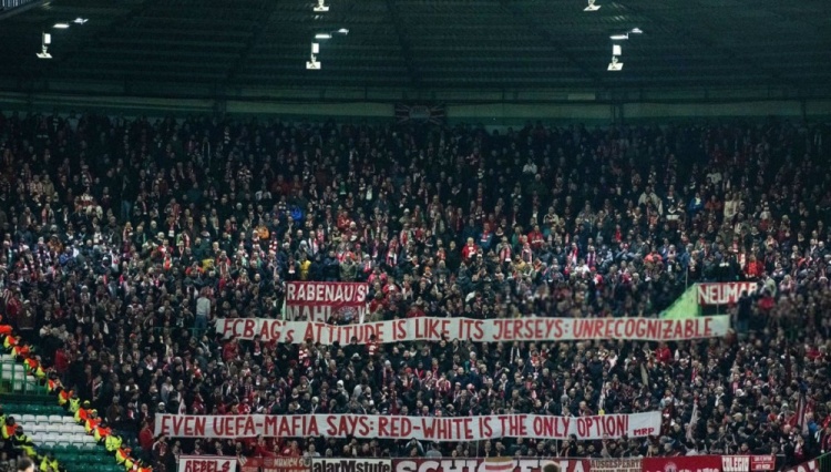  拜仁因?qū)Ρ榷葐?wèn)題無(wú)法在歐冠穿主場(chǎng)球衣，球迷橫幅呼吁用白色號(hào)碼